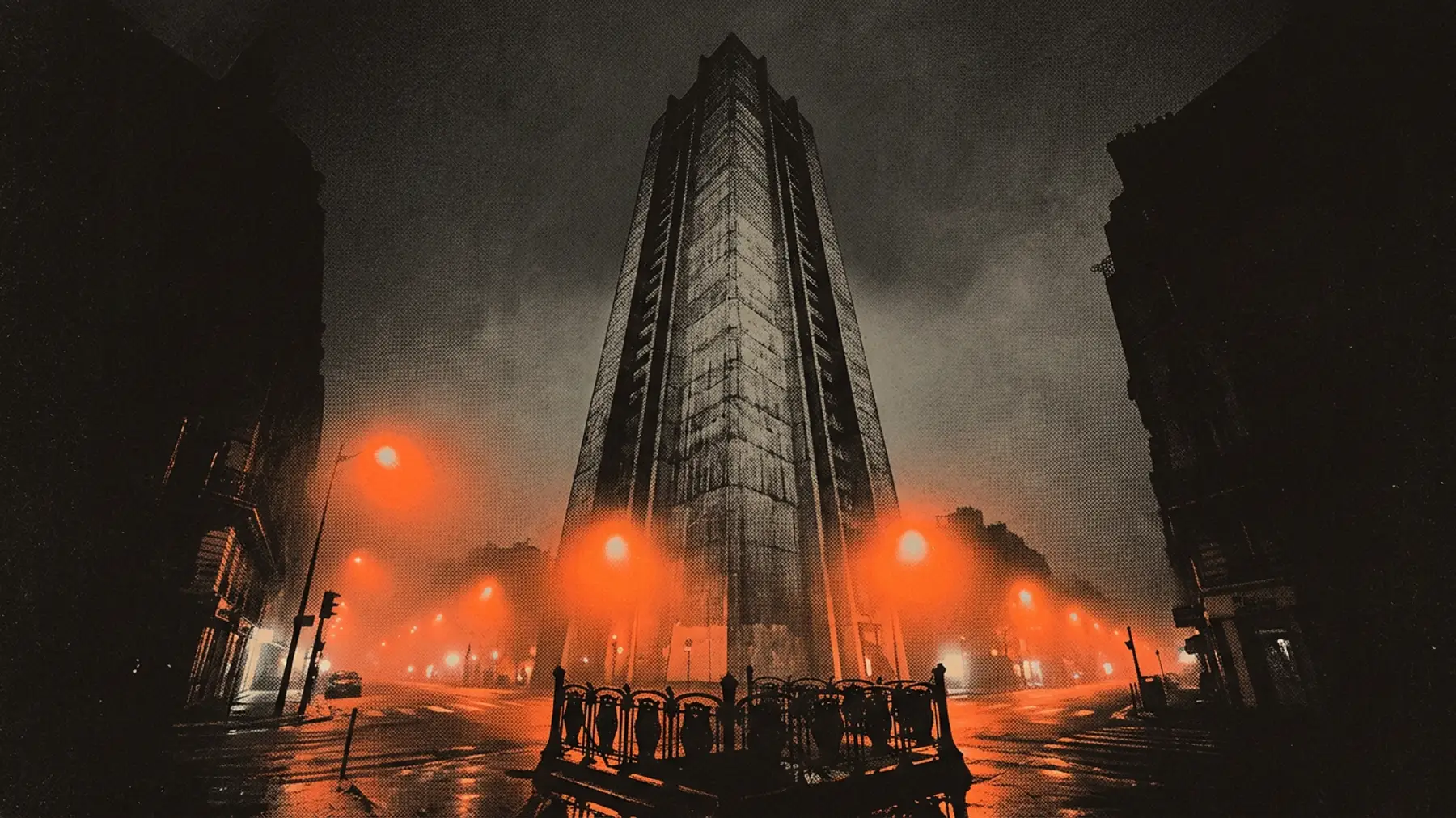 La tour de béton de Montparnasse dans le brouillard, la nuit, sous les lampes au sodium